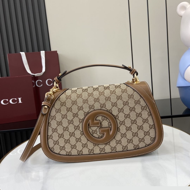 G*u*i top handle bags